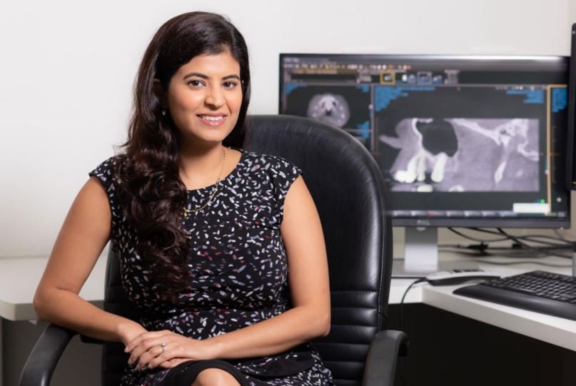 Dr Yastira Lalla, Dental and Maxillofacial Radiologist, at a CBCT reporting workstation