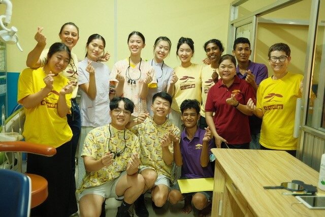 Volunteer dentists treating patients in Cambodia
