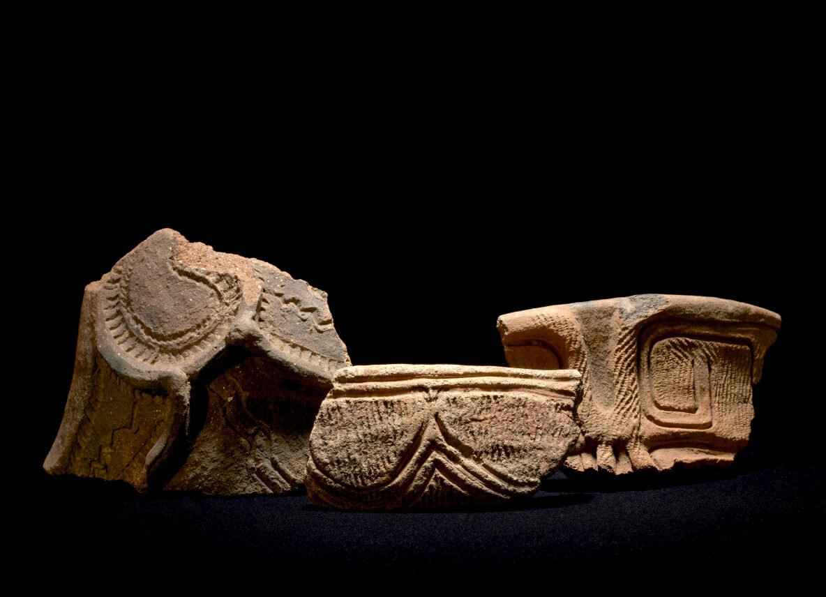 Ancient decorated pottery fragments &mdash; among the oldest ceramics in the exhibition