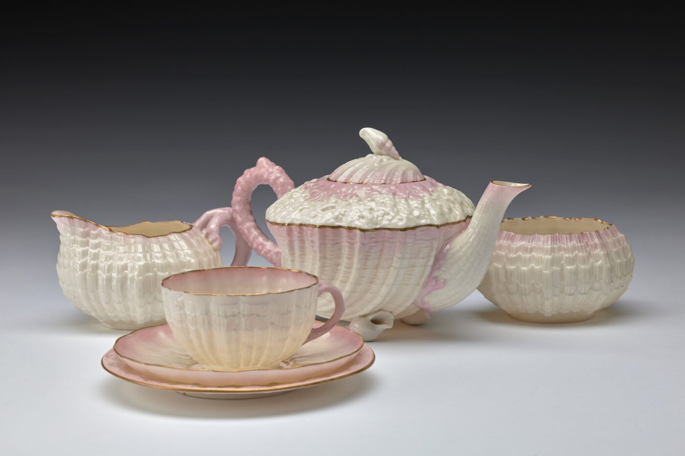 A delicate Belleek-style shell-form porcelain tea set