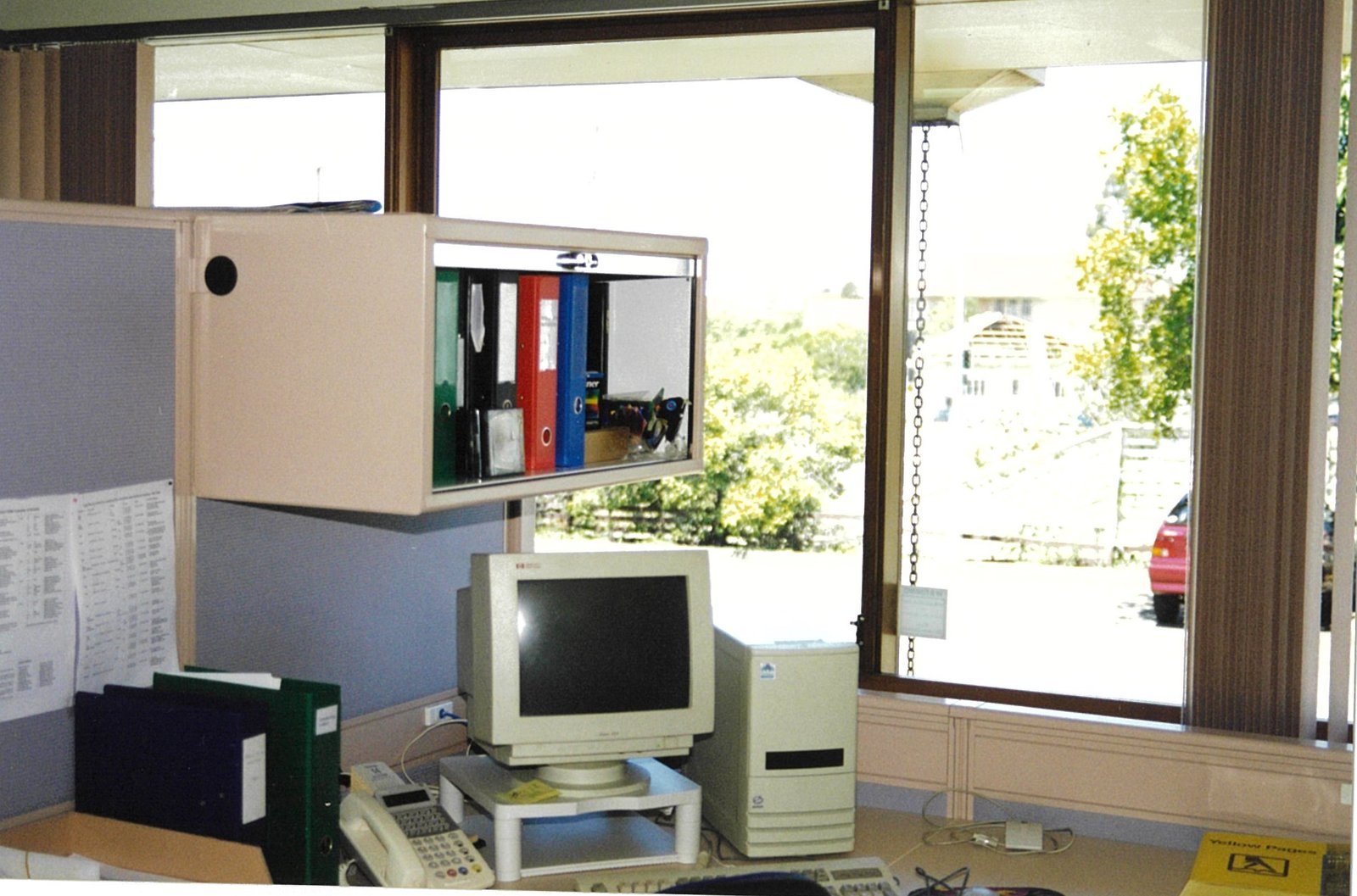 An ADAQ office workstation in the 1990s, with desktop computer and lever-arch files
